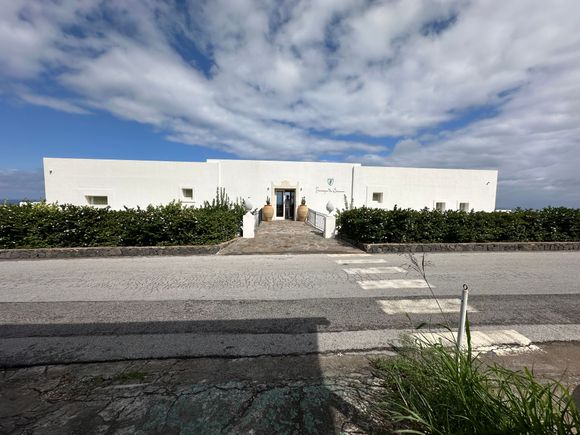 Hotel PRINCIPE DI SALINA, outside Malfa.  Twelve rooms and two large suites.  All rooms have sea views and a/c.   We even have a small tv on the wall with about 4 stations including the French Monde24 (?) broadcasting in English.   