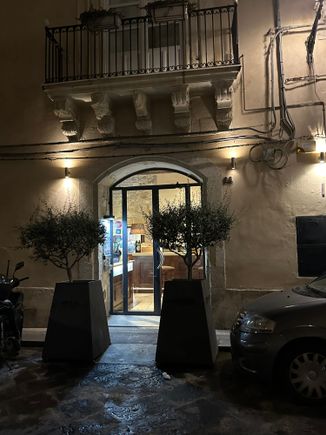 Entrance to Don Camillo, considered the finest restaurant in Ortigia.(Siracusa).   We arrived via the hotel shuttle, which left us at the bridge connecting Ortigia with Siracusa.