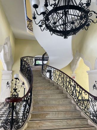 Mansion Caraval. This is mostly government offices now, but you have to see the stair case.