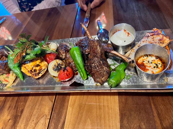 Mixed grill Meat platter consisting of:
Rack of lamb, filet mignon AAA, Shish Taouk, Aleppo kebab, grilled lamb kibbeh, Biwaz bread.


