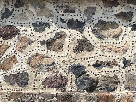 Another interesting thing I learned on the tour.  I've seen these stones between the masonary at a lot of sites.   Many of these sites have had reconstruction, and to show where the reconstruction is, the archaelogists have put in these pebbles or rocks to highlight that section