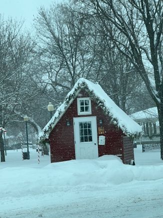 Santa has a house located in Central Park with assistance from the fire department.