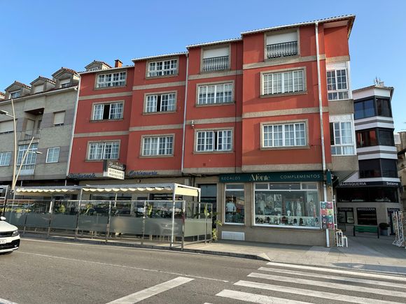 Exterior of BEIRAMAR restaurant, facing the port; while we were eating, a fisherman and a shellfish gatherer entered the restaurant to drop off part of their daily haul, emptying bogavante (type of lobster) right into the large tank