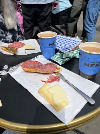 We on the other hand scored a table at a coffee place.  Our knees don't allow us to sit on curbs anymore.