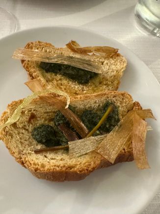 Bruschetta with cooked chicory and parmigiana; melanzane seasons ia bout over, and the bitter greens are appearing on local tables, earlier than most years