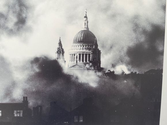 Britain is celebrating VE day and there is an outside display about the volunteers that helped save the church during the Blitz, this is a famous photo of St. Paul's standing!