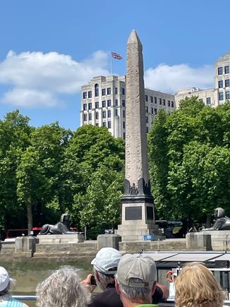 Cleopatra's Needle with Sphinx.  This is an ancient Egyptian obelisk, given to the British people for kicking Napoleon in the pants...and out of Egypt.  Having been to the British Museum, it looks like a lot of other stuff may have 
"fallen of the truck" and landed in London
