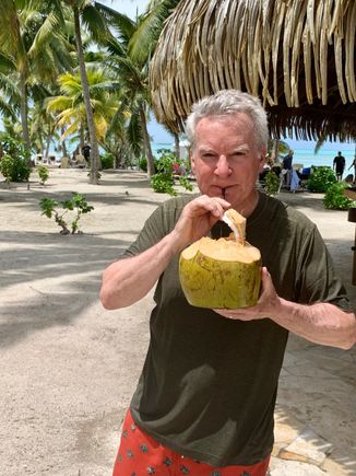 Me enjoying a Piña Colada from a hallowed out coconut 
