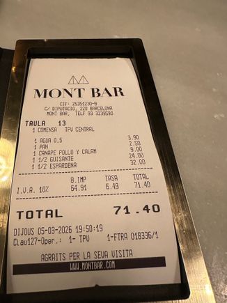 My bill from my first meal in Barcelona.  
I later mourned the fact that I did not order the suckling pig Cantonesa.  My obsession with trying this dish would prove to be a very costly mistake a few days later.

Dinner, with water and three half orders plus two comped courses was 73 euro.   Very reasonable for one of the city’s best eateries recently awarded its second Michelin star.    

Tiny dining room reminiscent of a Parisian “gastro bistro” with no pretensions, no tablecloths.      
