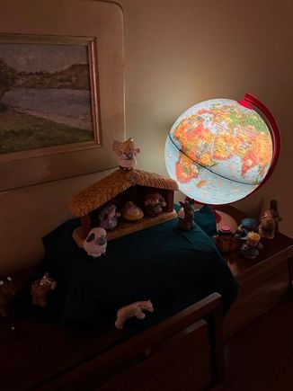 Kate’s Little People nativity. I set it up every year. She used to add dinosaurs and polar bears and giraffes. 