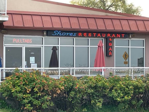 Could it be because Shores Restaurant has Karoake and Pulltabs? Whatever those are?