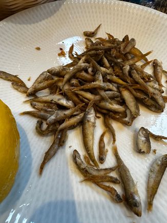 Fried tiny anchovies, served with lemon; I'm not a big anchovy fan but these were difficult to stop munching on....