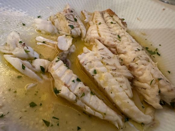 Dentice (described as a type of bream) was brought to the table for my approval, then taken back to the kitchen to be filleted.   Absolutely exquisite, and the most expensive dish, at 49 euro for about a half kilo..I wiped the plate clean!