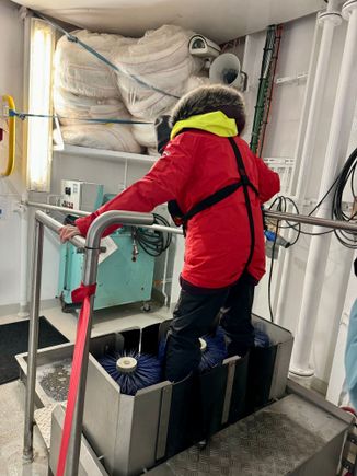 Unfortunately, the Avian Flu has reached the southern hemisphere and is wreaking havoc on the birds and seals. So our ship provided boots get a thorough inspection before leaving the ship and a thorough cleaning upon return. Bio security is taken very seriously. That be Joyce. The natty rainproof and wind proof Helly Hensen jackets are are provided by Hurtigruten and are our souvenir.