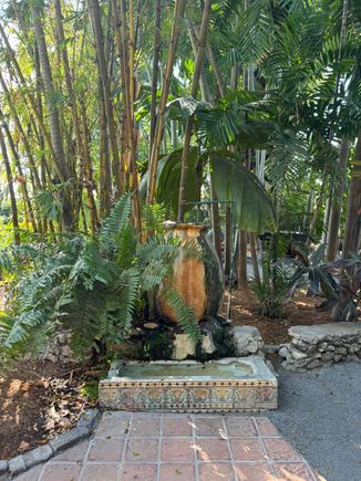 Fountain at the Hemingway House - the jar is a giant olive jar; The basin is a urinal from the original Sloppy Joe's building