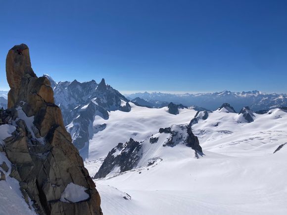 If you look closely on the rock on the left, you will see 2 individuals up there