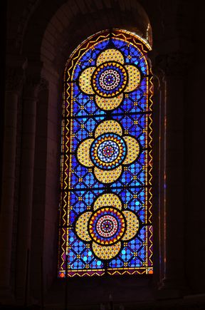 Stained glass in Collegiale St. Ours.