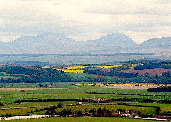 A view from Stirling Castle with the neon colored rapeseed fields