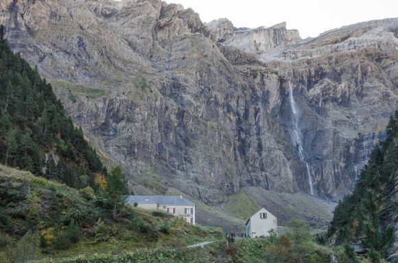 Flaubert: 'The purpose of Travel is to show you how small we all are.' It was a measure of just how high these mountains are, that the cirque was still in shadow at noon. The Grande Cascade shown above is the highest waterfall in Europe. Above them: jagged l'Epaule (3073m). The Lacoste family have re-opened their traditional hotel seen on the left and it's back patio was a great place for a restorative cocoa at 1580m. The hotel transfer van was the only authorized road vehicle. 
















