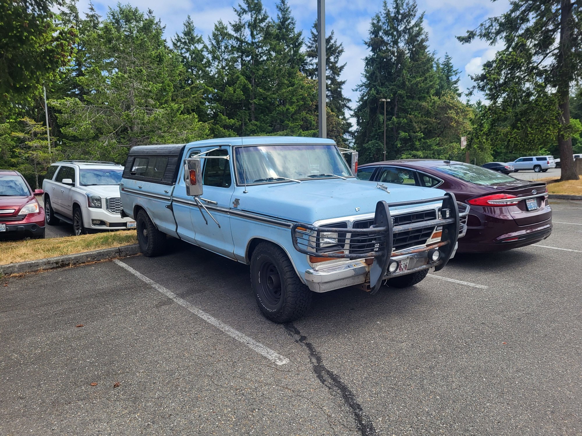 78 f350 2wd that someone squeezed a isuzu diesel into. 