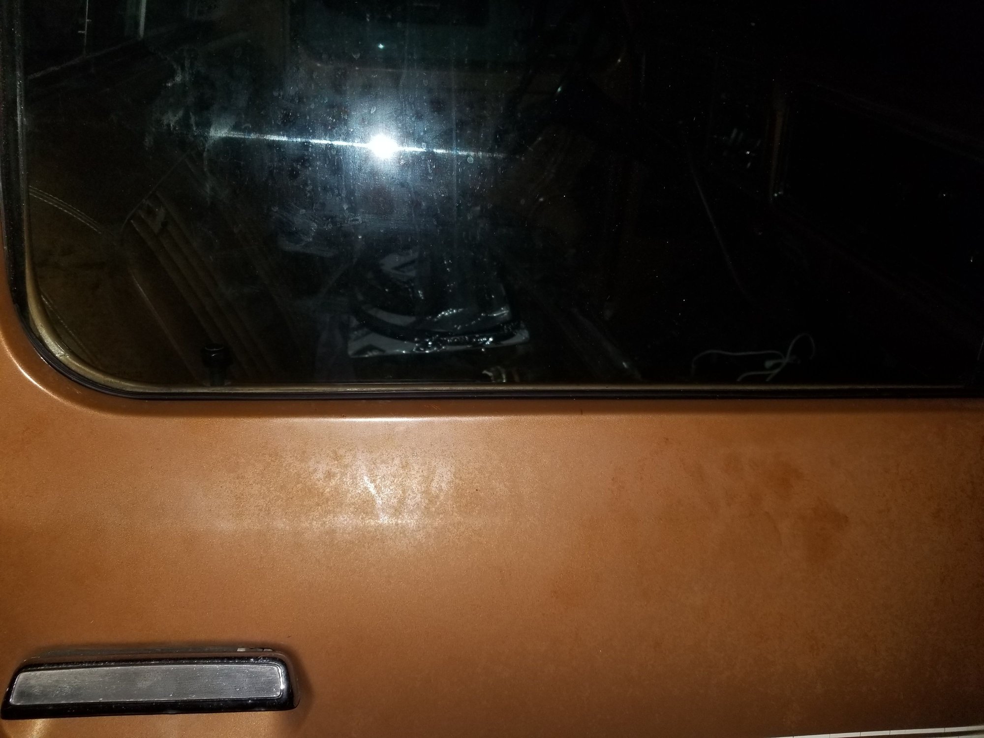 Passenger side, new seal. Zoom in if you need to but this side the seal is so high up i can see the felt under it. The other side it sits much lower