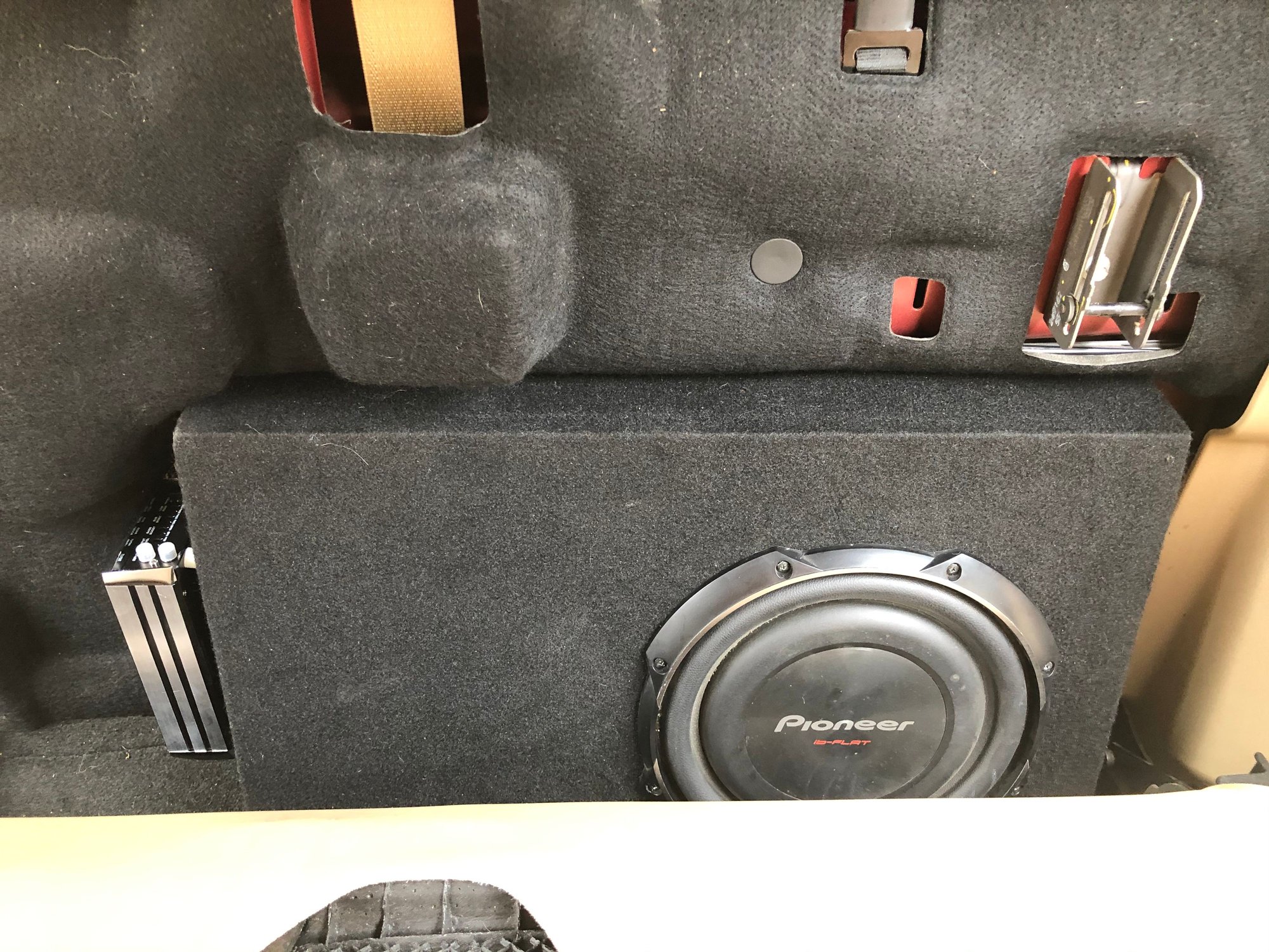 Behind seat sale subwoofer