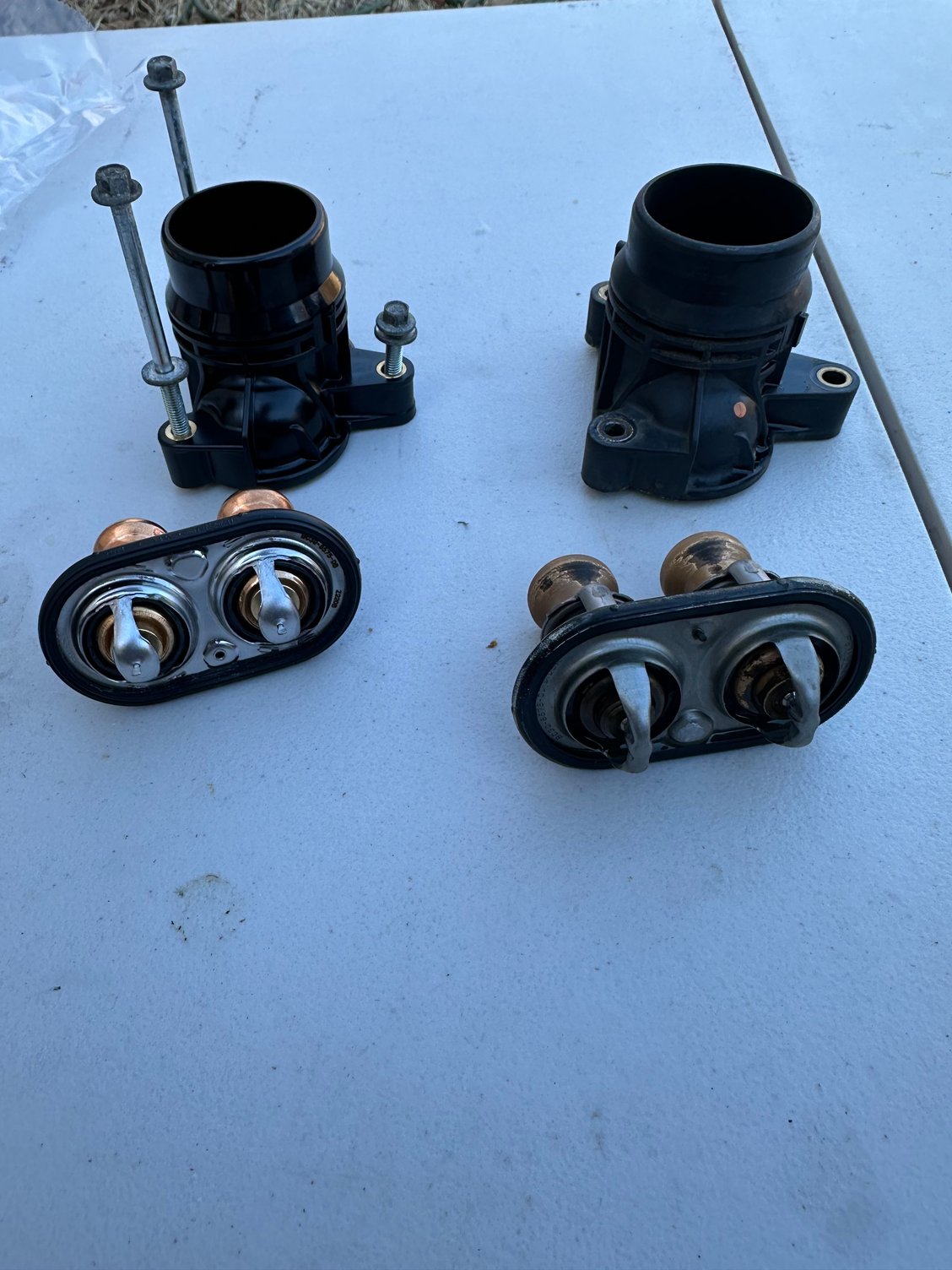 replaced thermostat + housing while in there
