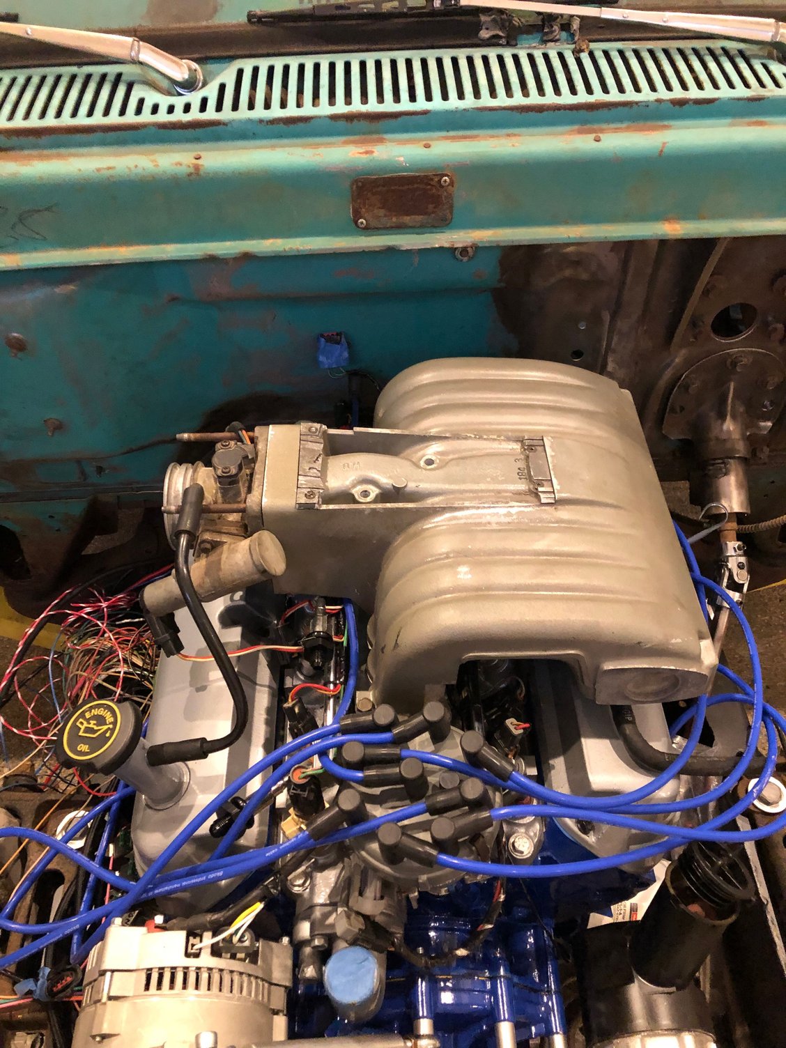 The coil and map sensor will mounted on the fire wall. I need to make sure I don�t drill into something before I mount them.  I will use self tapping screws to attach them temporarily and weld nuts to the inside before paint. 
