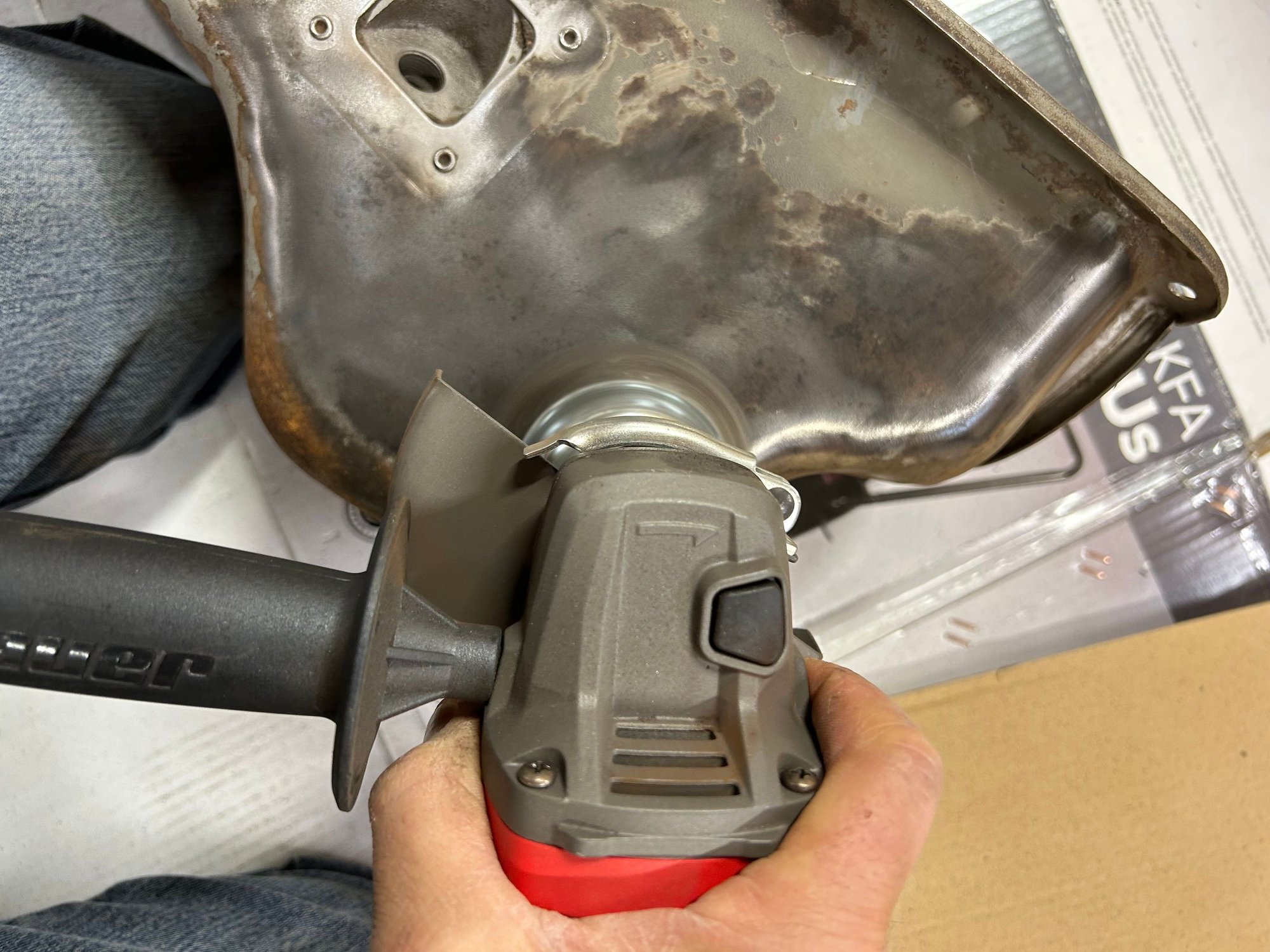 Then I ran out of my coal slag that I was using to blast with. So I just went back to the wire wheel and cleaned up the oil pan and the valve covers with that. It worked out pretty good.
