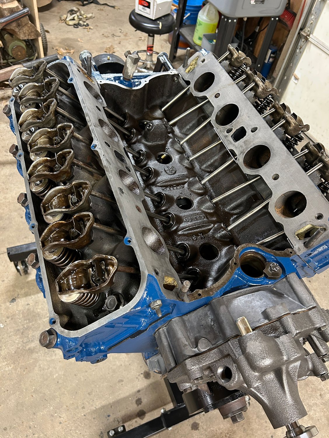 Ran in and ate supper and then got right back out and started knocking out installing the lifters, pushrods, and the rocker arms and got everything torque down.