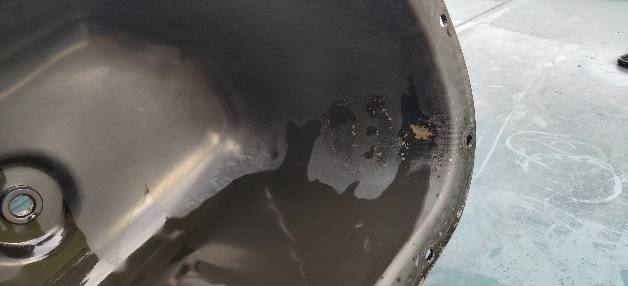 Oil pan rust/paint coming off of inside of oil pan as well Ford Truck