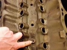 For those unfamiliar, these are the tapped spider hold down holes in a 94-96 roller 5.8L block. They are directly atop the #2 and #4 cam bores.
