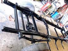 Frame blasted, epoxy primed and painted gloss black.