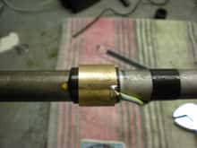 This is a bronze bushing that makes up to the contact.
