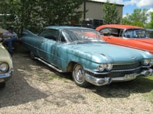 unrestored 59 caddy  , enough sheet metal for 2 ford trucks 