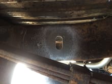 I chose to align the tire hoist with this already present hole in the 66 frame