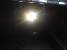 now the light is mounted on the console safe bracket at the back of the console. It lights up the whole inside of the console now. 