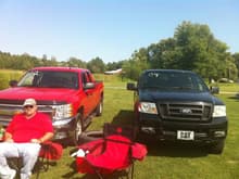 My dad's 2012 Chevrolet Z71 5.3 with the 6 speed auto next to my 2004 Ford F150. It ran 10.77's, my truck ran 10.51 with crappy reaction.