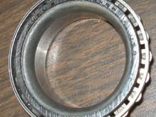 Inner side of OEM inner wheel bearing.  This has been in use for 11 years.  Timkin JL69349P.