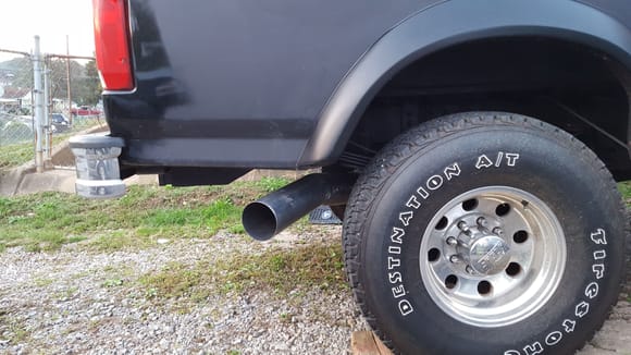Diamond Eye 5 unch stainless turbo back kit. Bought it from RiffRaff... I like it fine..
Looks like you are going to have a very tight fit with that down pipe!