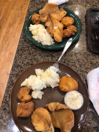 Fried flounder, hushpuppies, mashed taters and double stuff deep fried oreos wrapped in crescent rolls.

Best meal ive had in a long long time
