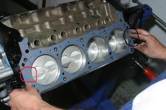 The gasket covers the water jacket holes only on the right side of the picture.