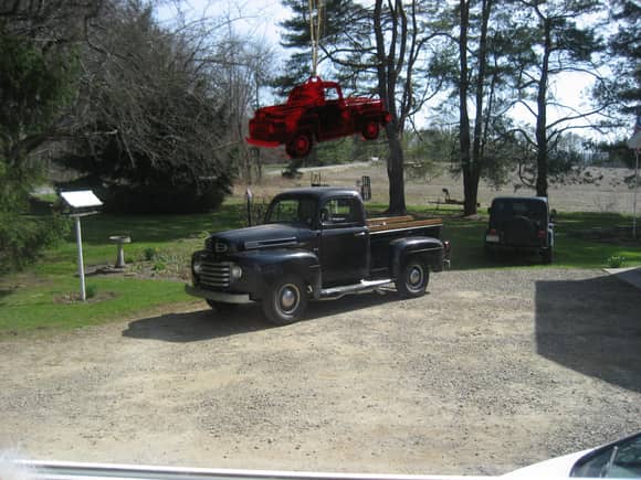 This is Easter Sunday.  Looking out the kitchen window.  The ornament above the truck is hanging on the window.  It is plastic made from a laser engraver.