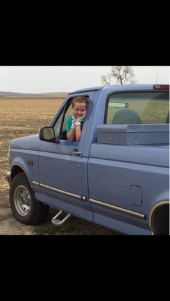 My favorite picture of the truck.  My middle daughter sitting in it.  She has since passed.  One of my all time favorite pictures of her.