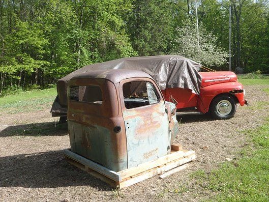 truck cab - a donor from California shipped to Maine.  Why not?  The truck was originally built out there.  The original cab stunk like hell, was rusted out, and hacked.