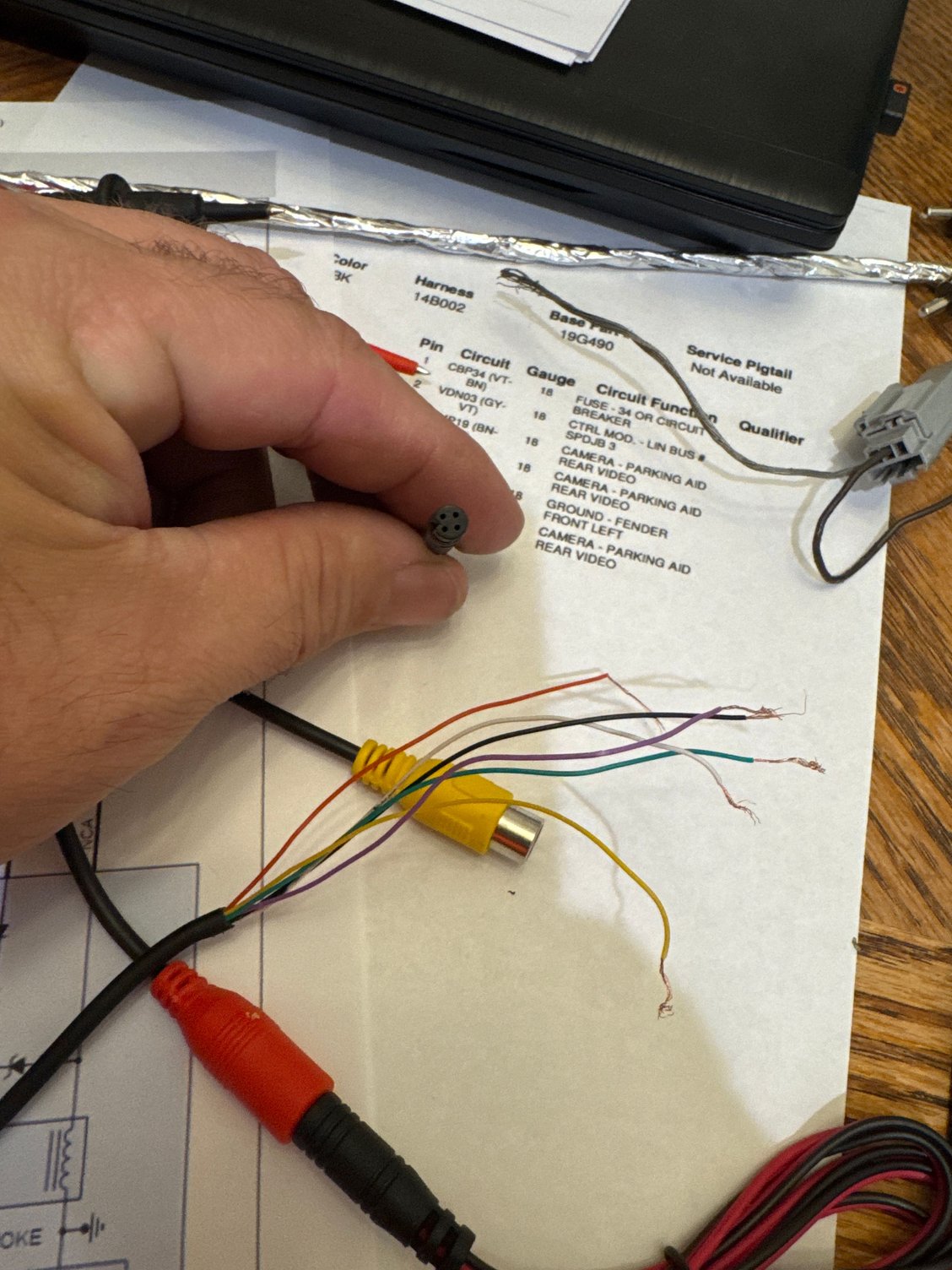 I have aftermarket wiring that was ran for an aftermarket camera. Now I�m trying to use an oem camera. This picture shows the aftermarket wiring that is on the tailgate side of the hatch. I will include both ends as well