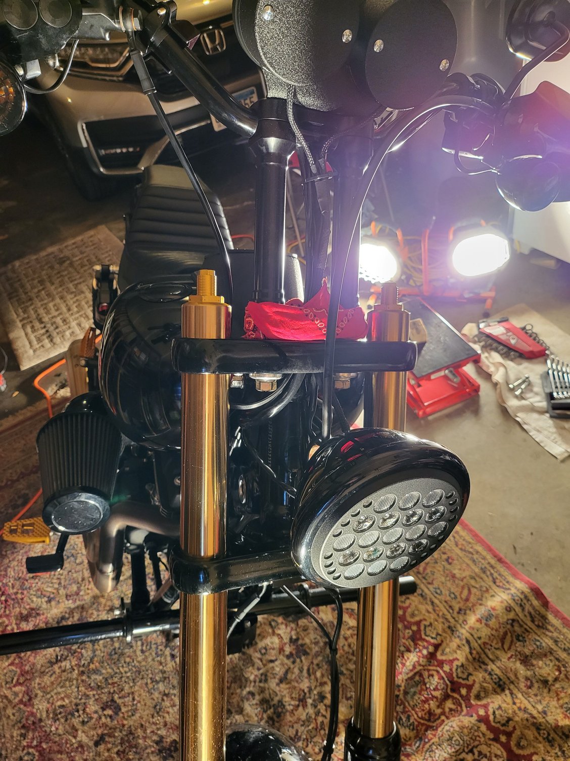 Front brake calipers touching rotors after fork tube change Harley