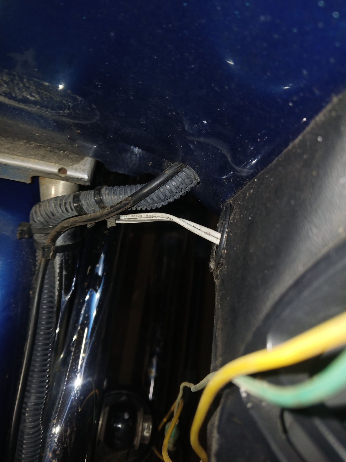 Same harness going into the trunk hole hooked to relay.
