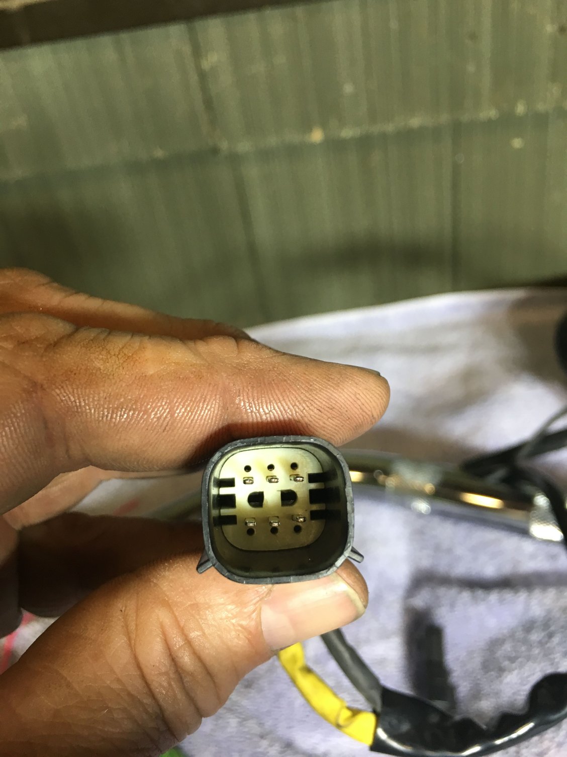 Help! How do you remove the pins from the throttle by wire plug