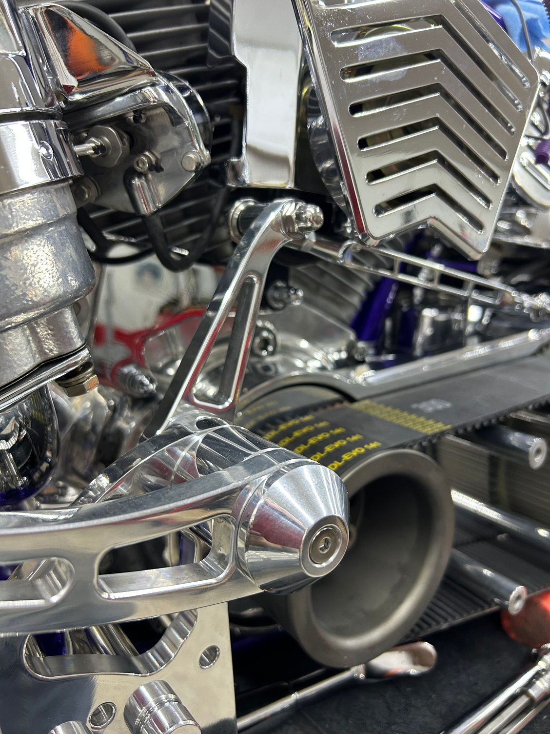 Not much clearance as the rod runs under the horn and the fuel pump and other stuff